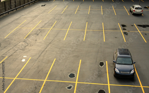 Fotografie Aerial view of a parking lot with cars