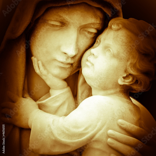 Vintage image of the virgin Mary carrying baby Jesus photo
