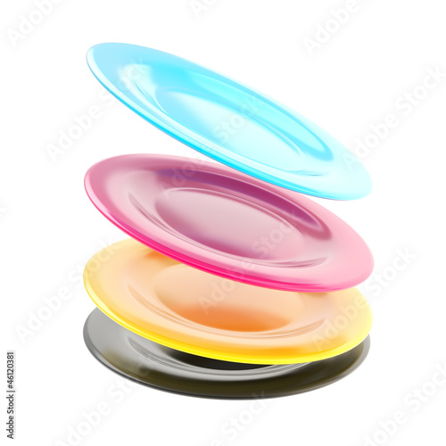 Stack of plate dishes in a motion isolated on white