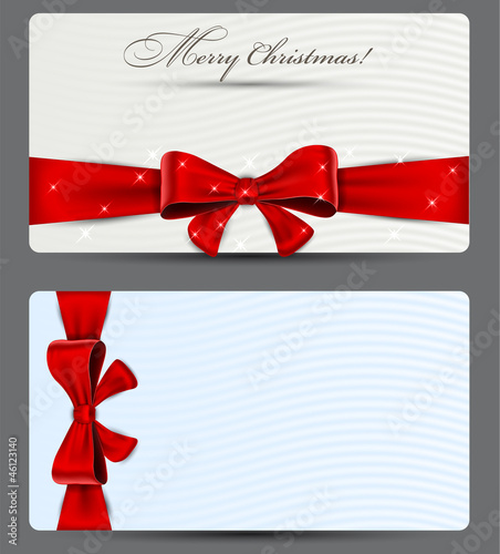 Gift cards with red bow.