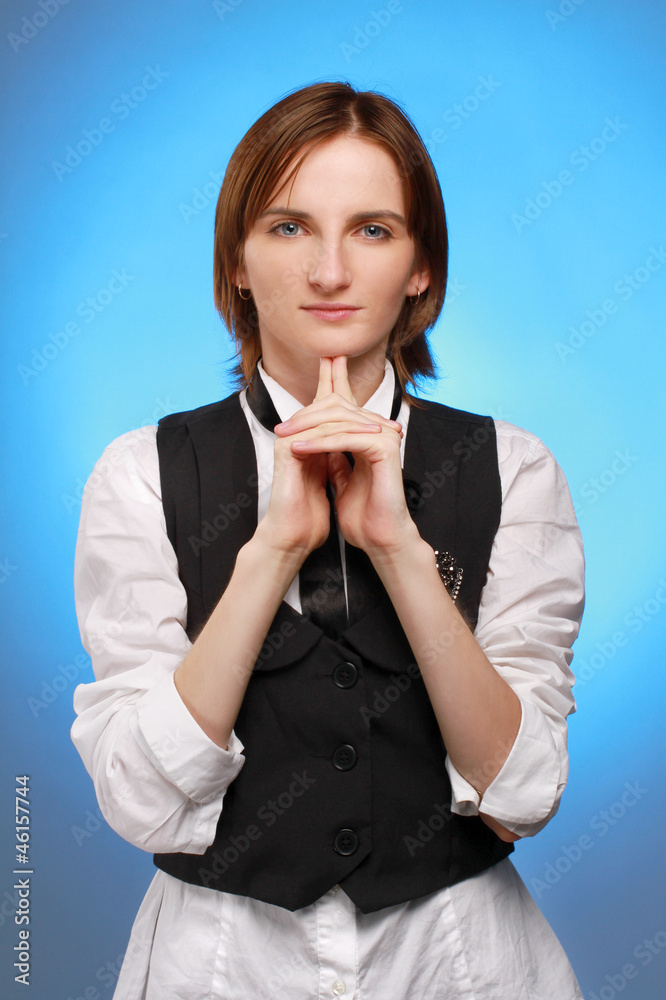 Young businesswoman hold her finger at her chin Young businesswoman hold her finger at her chin
