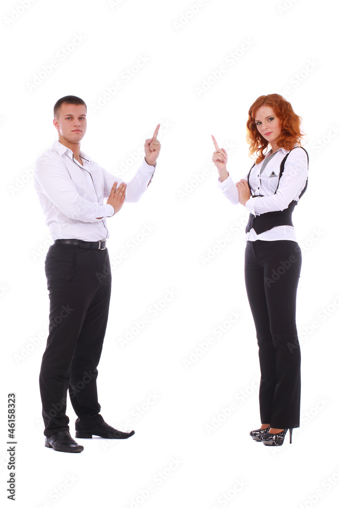 Business concept. Young guy and girl showing finger up in white Business concept. Young guy and girl showing finger up in white