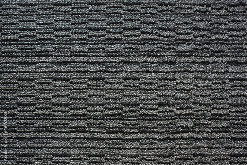 Pattern of a gray black woven carpet