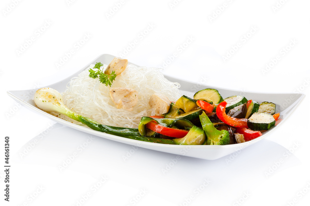 Roasted meat, rice noodles and vegetables on white background Roasted meat, rice noodles and vegetables on white background