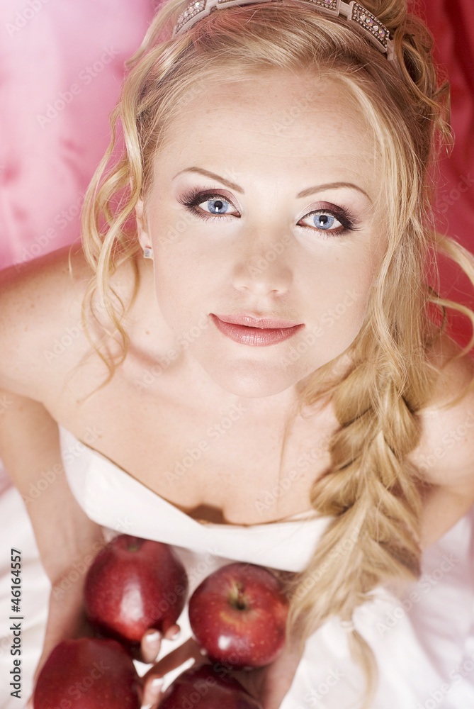 Portrait of girl with red apple. Beautiful girl in studio. Portrait of girl with red apple. Beautiful girl in studio.