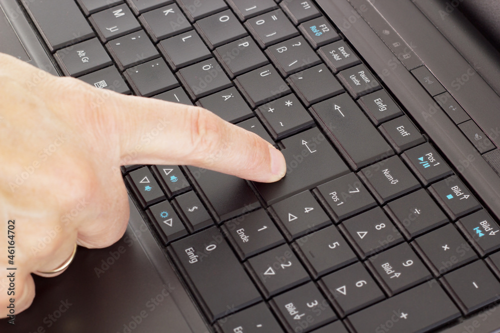 Person typing on the computer