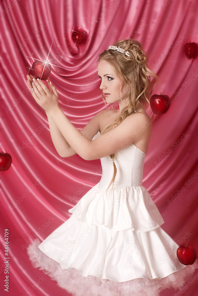 Portrait of girl with red apple. Beautiful girl in studio. Portrait of girl with red apple. Beautiful girl in studio.