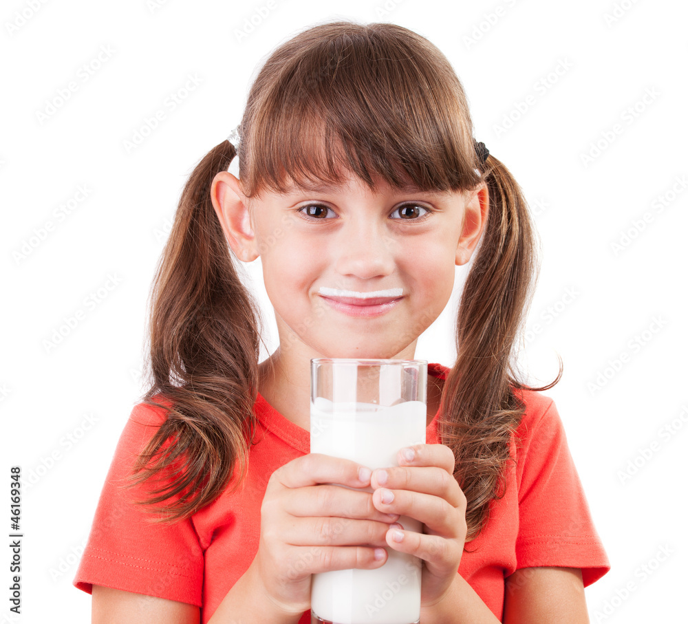Little girl with a glass of buttermilk Little girl with a glass of buttermilk