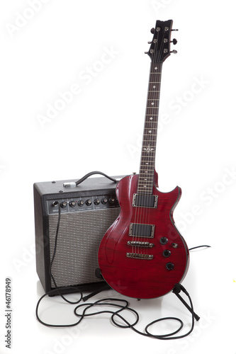 An electric guitar and amp on a white background with copy space photo