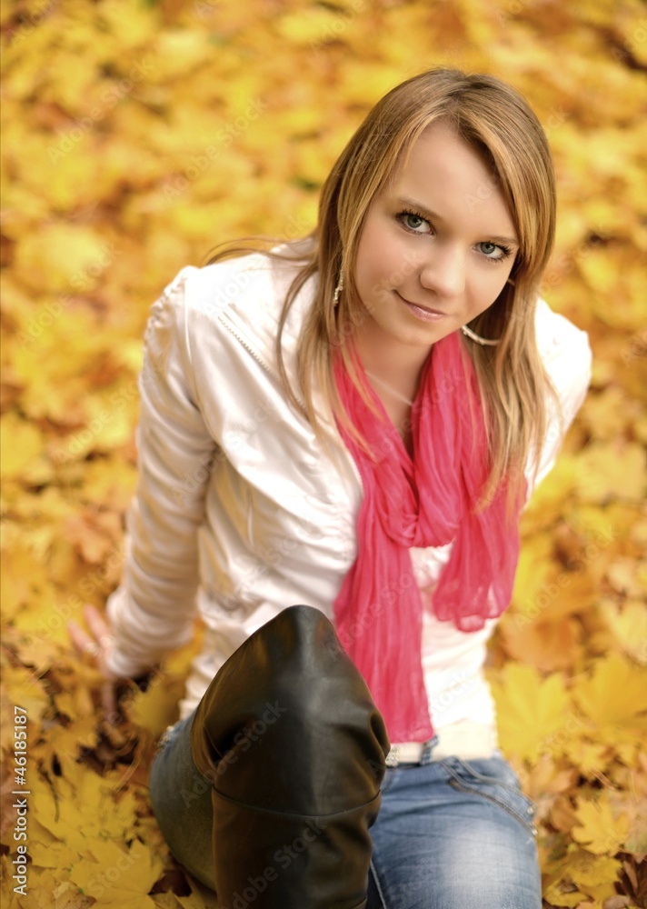 Autumn woman on leafs background Autumn woman on leafs background