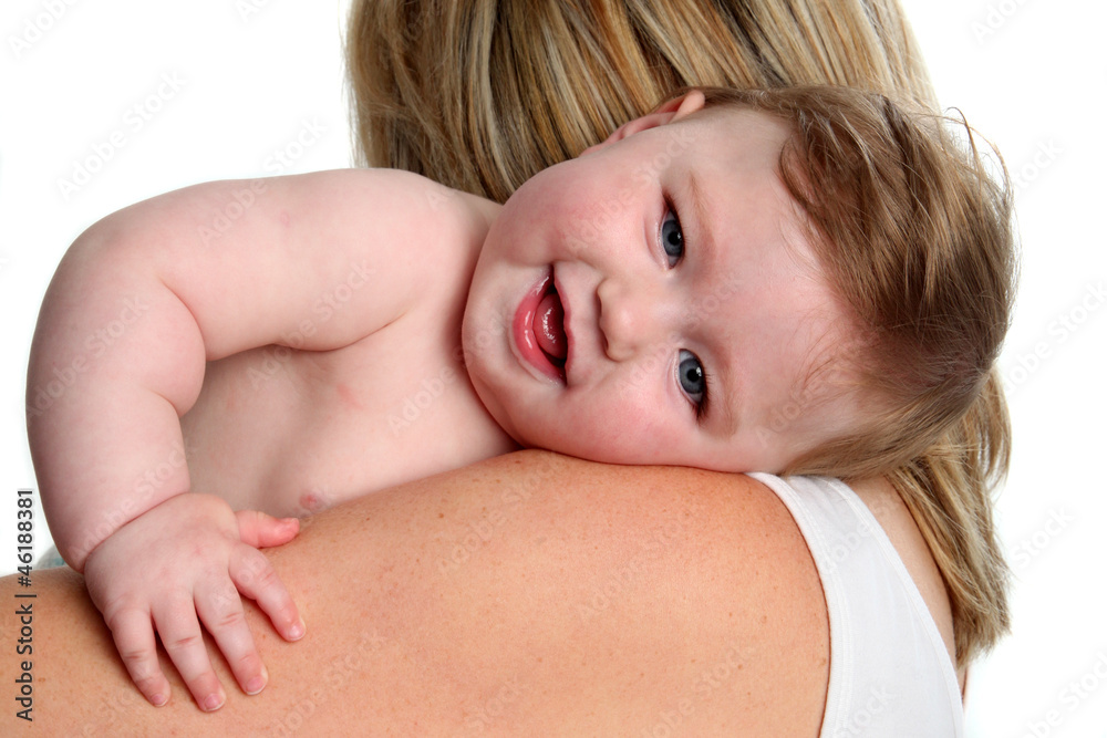 Baby lying on her mothers shoulder Baby lying on her mothers shoulder