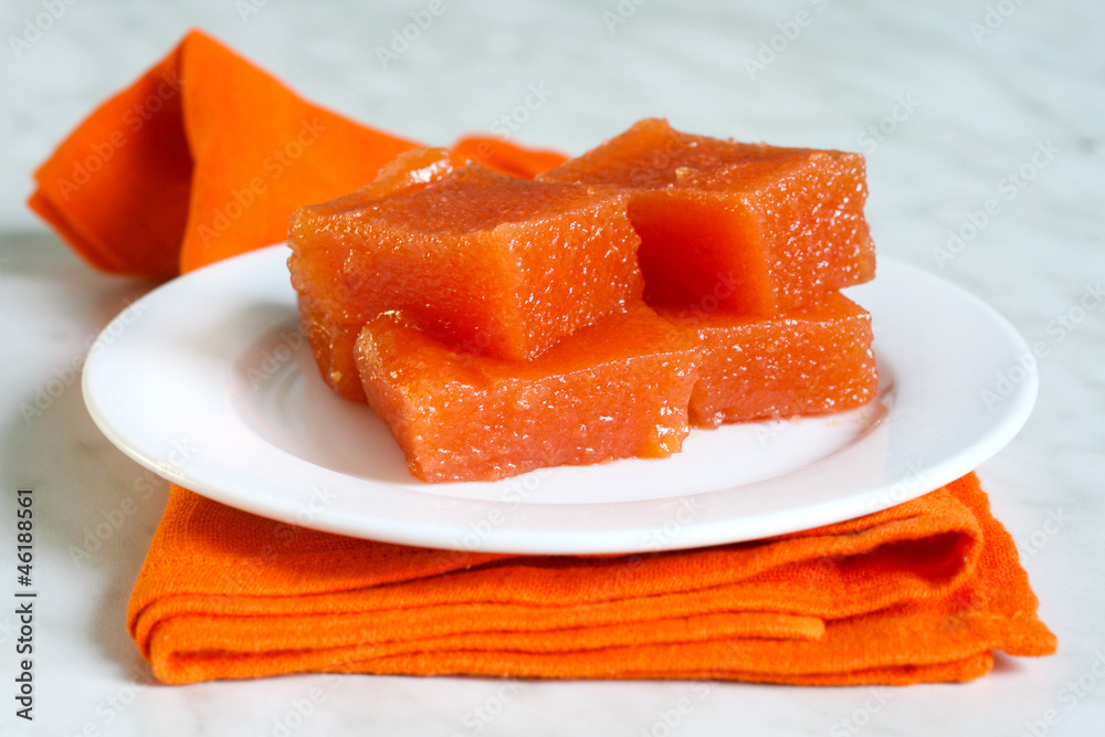 a pieces of quince paste - dulce de membrillo, typical of Spain a pieces of quince paste - dulce de membrillo, typical of Spain
