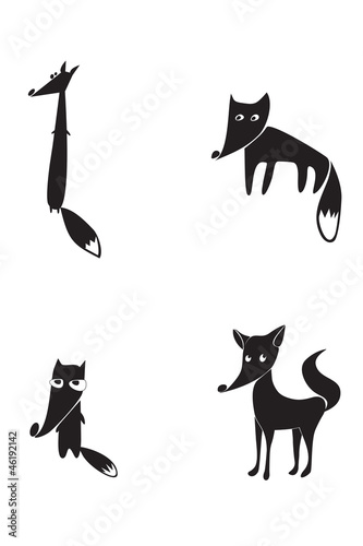 The black silhouettes of four foxes photo