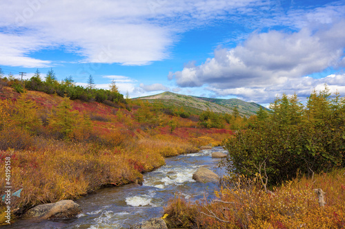 Autumn landscape of sream among the hills © dmitriy_rnd