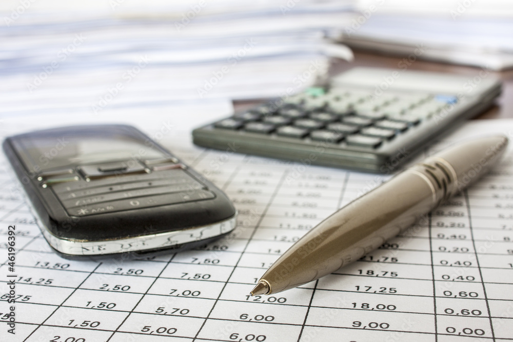 bills ,pen .cell phone and calculator,accounting bills ,pen .cell phone and calculator,accounting