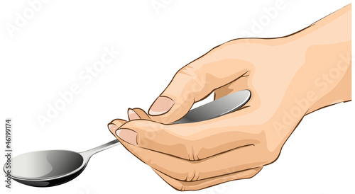 Hand is holding a spoon isolated on a white background