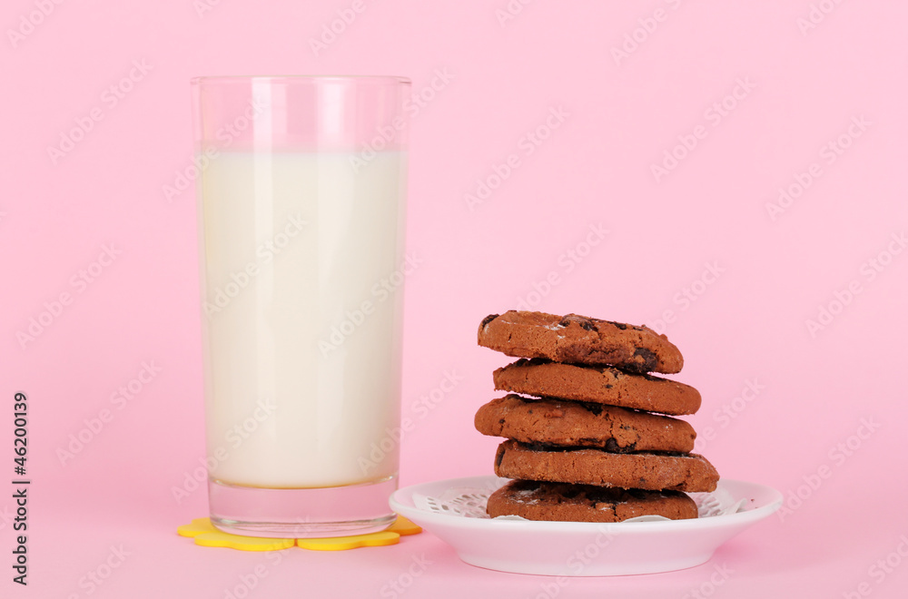 Glass of fresh new milk on pink background Glass of fresh new milk on pink background