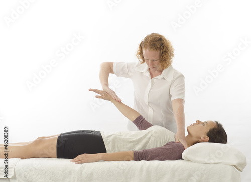Photography Kinesiologist treating anterior deltoid