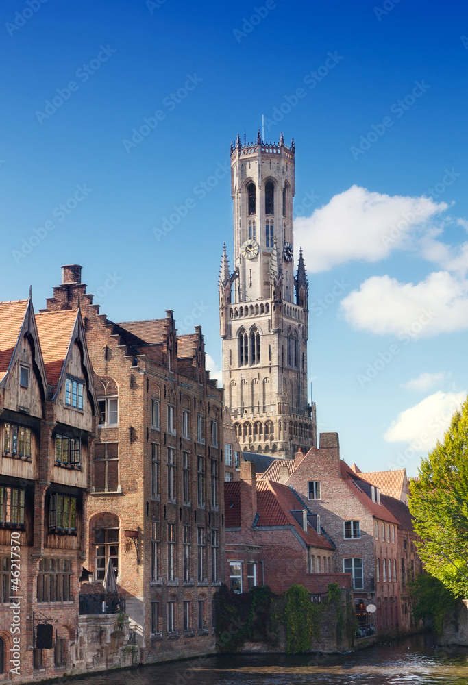 Classic view of channels of Bruges..Tower Belfort in Bruges