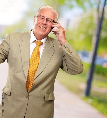 Senior Business Man Talking On Phone