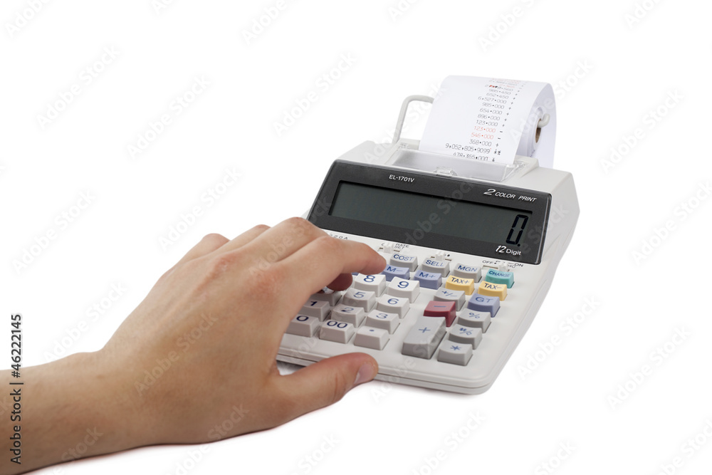 hand on calculator with printed receipt hand on calculator with printed receipt