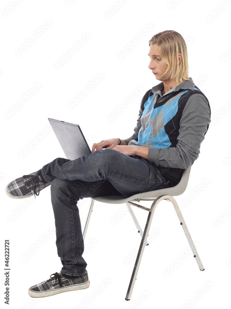 handsome university student using laptop handsome university student using laptop