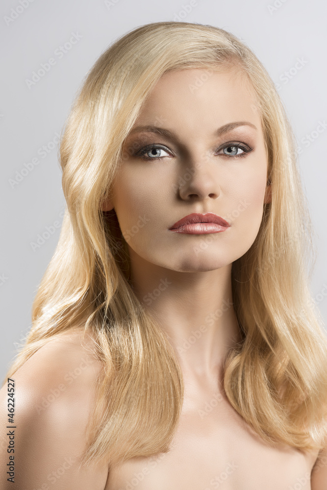 beauty portrait of pretty blonde girl with serious expression beauty portrait of pretty blonde girl with serious expression