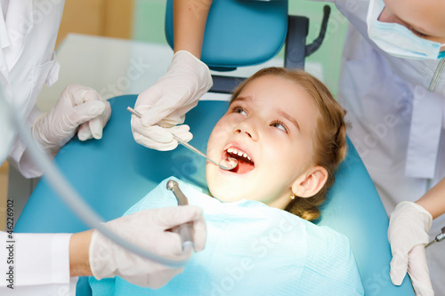 Little girl visiting dentist