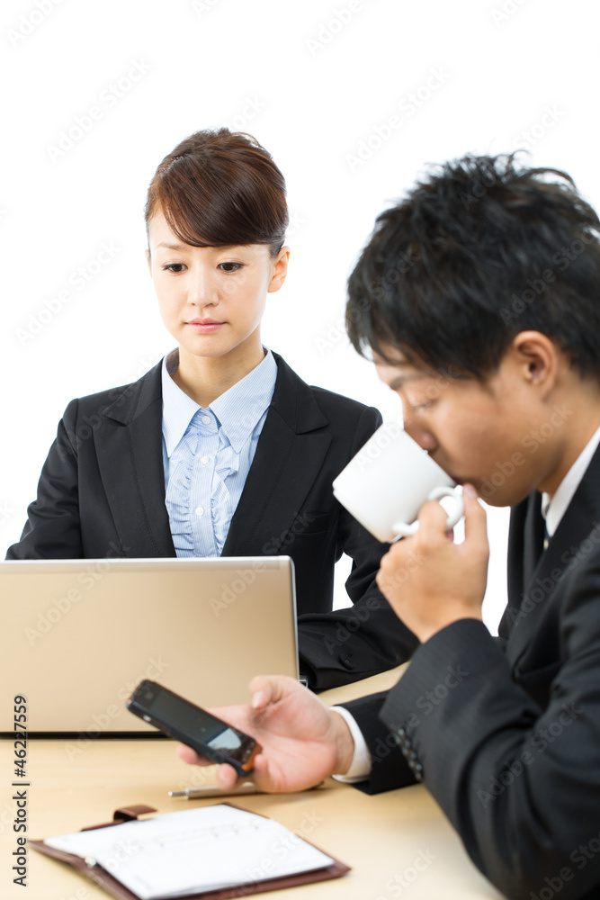 Young asian smiling business woman and businessman Young asian smiling business woman and businessman