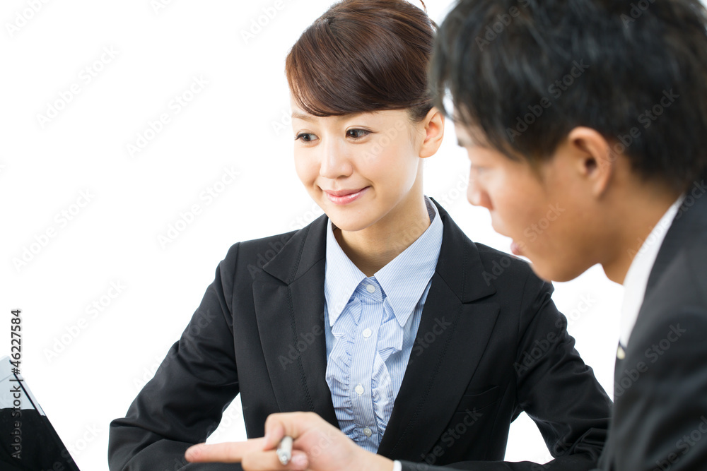 Young asian smiling business woman and businessman Young asian smiling business woman and businessman