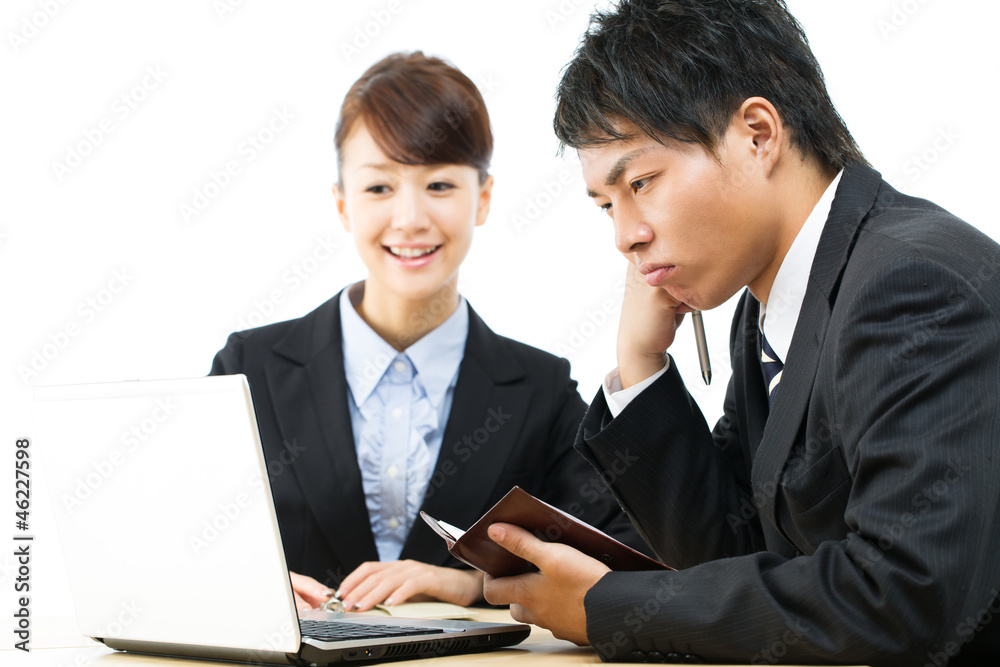Young asian smiling business woman and businessman Young asian smiling business woman and businessman