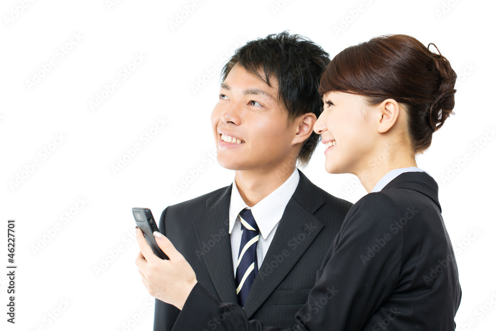 Young asian smiling business woman and businessman Young asian smiling business woman and businessman