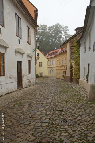 Foggy morning in an old streets of Prague.