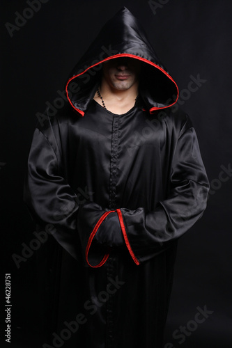 Young man in a monks robe photo