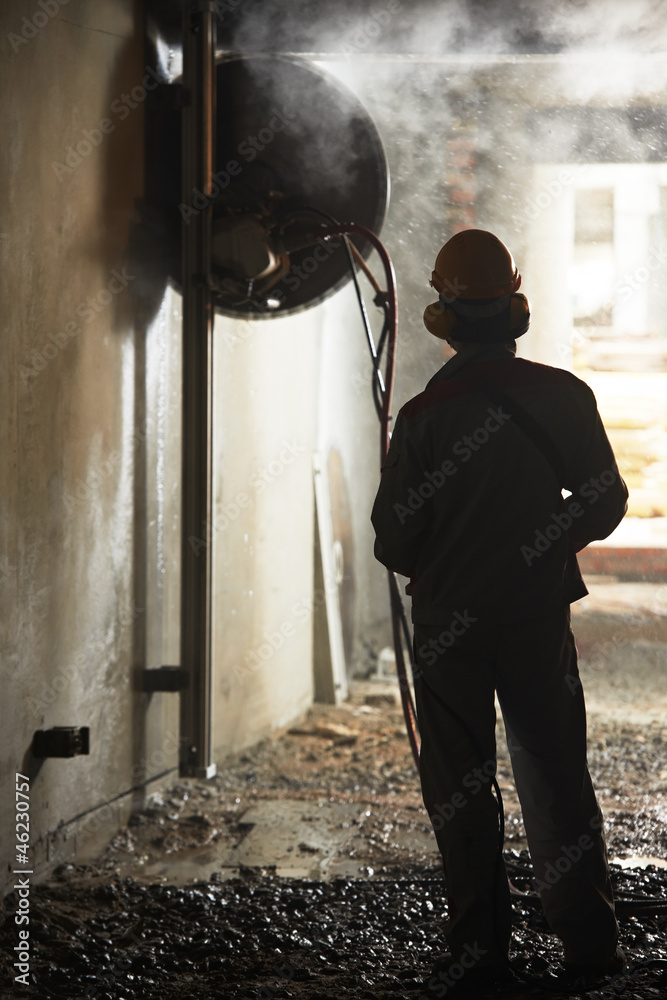 builder worker operating demolition machine builder worker operating demolition machine