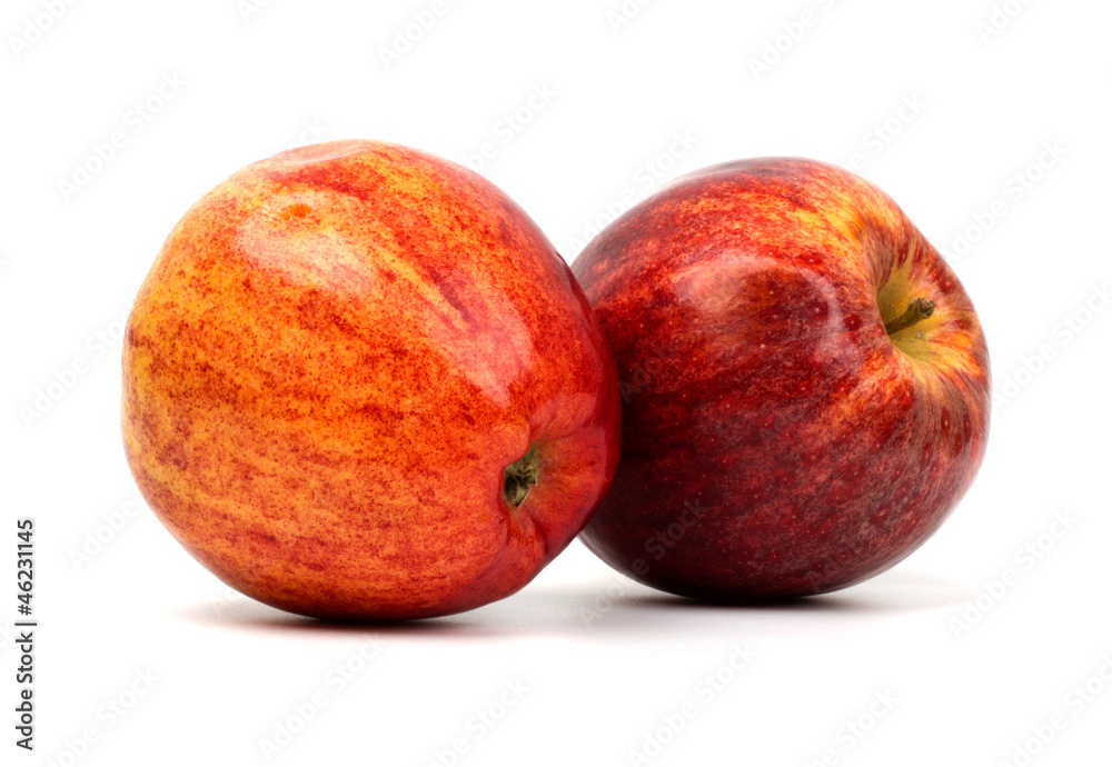 Whole red apples isolated on white background.