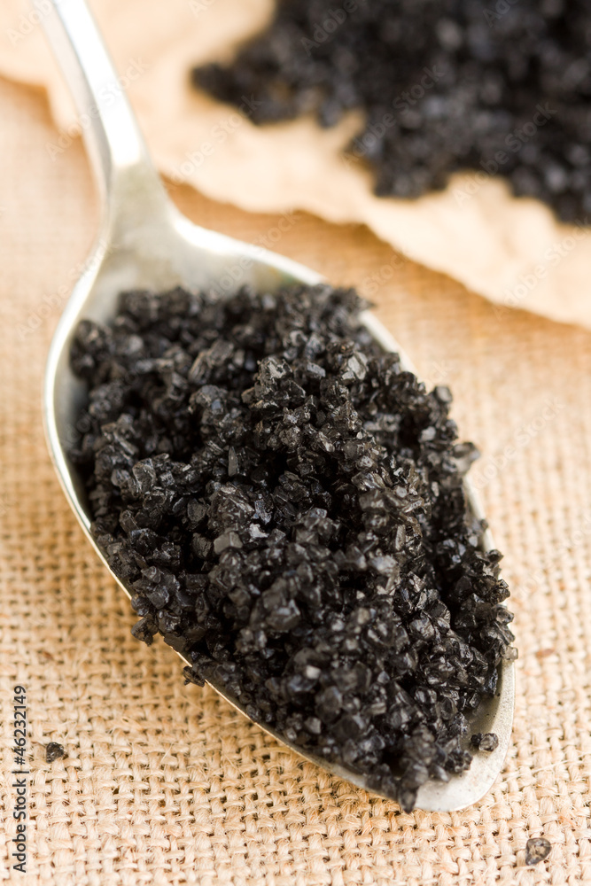 Hawaiian black salt in a spoon