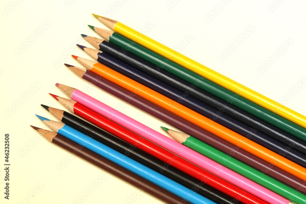 Assortment of coloured pencils with shadow on white background Assortment of coloured pencils with shadow on white background