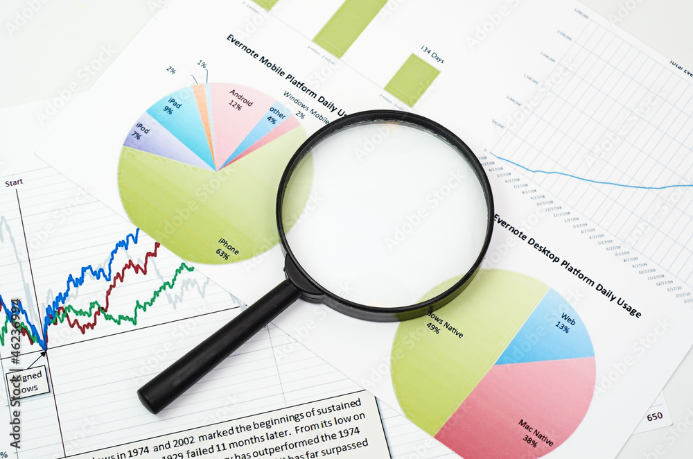 magnifying glass on graph business search magnifying glass on graph business search