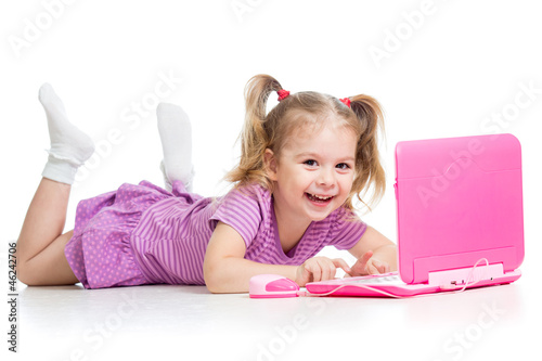 child girl playing with laptop toy