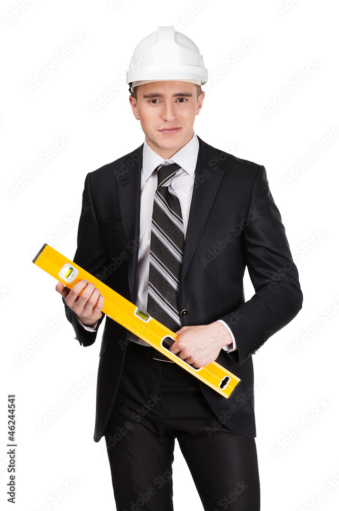 Contractor in white with engineer's level, isolated on white Contractor in white with engineer's level, isolated on white