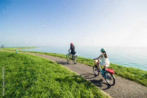 Kids riding bikes on summer day