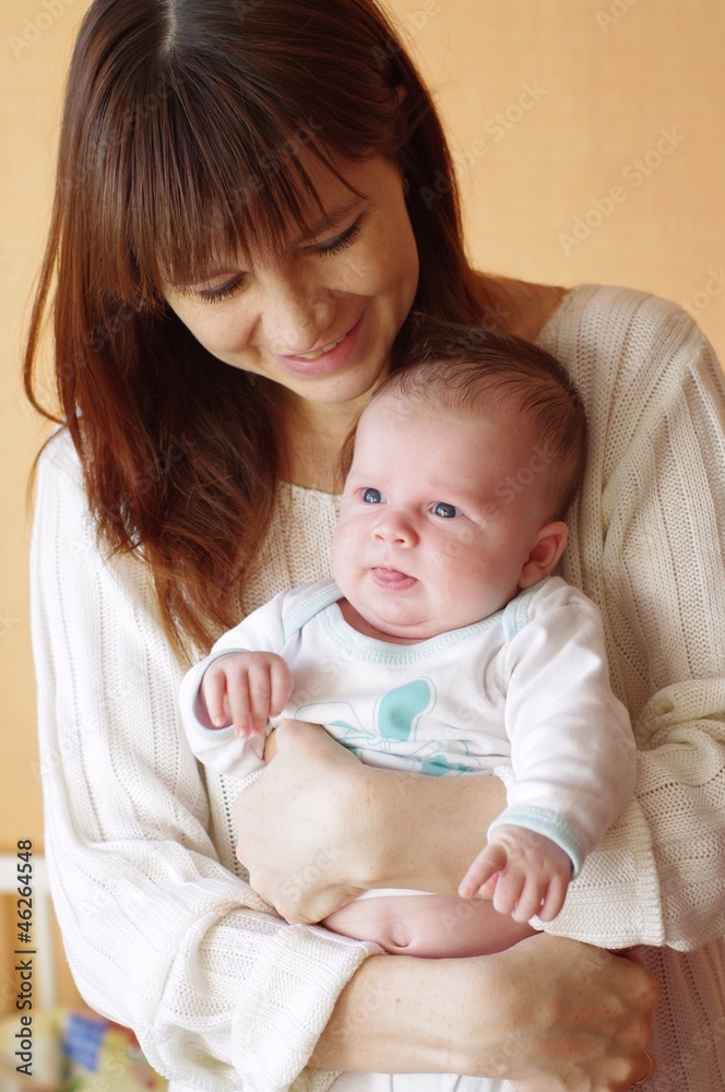 Mother presses to itself the small child (1 month) Mother presses to itself the small child (1 month)
