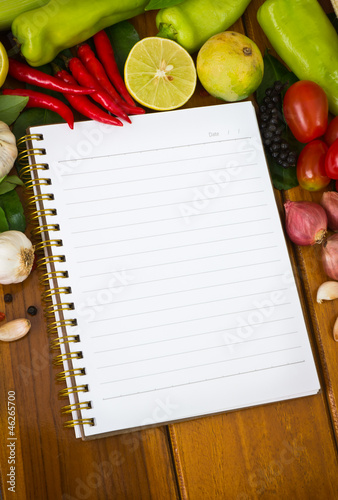 Fresh vegetables and spices with paper for note