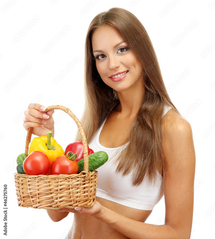 beautiful young woman with vegetables in basket, isolated beautiful young woman with vegetables in basket, isolated