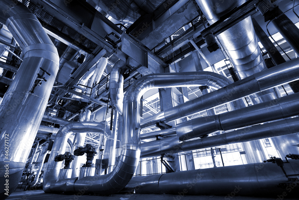 Industrial zone, Steel pipelines and cables in blue tones Industrial zone, Steel pipelines and cables in blue tones