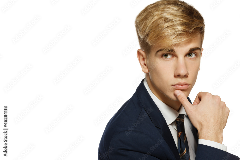 Closeup of handsome young man with chin on hand Closeup of handsome young man with chin on hand