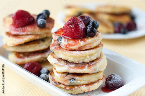 Delicious homemade cheese pancakes with berries
