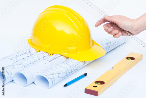 construction helmet and architect tools