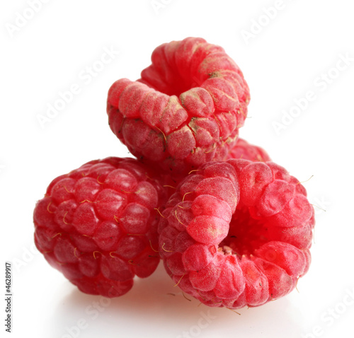 ripe raspberries isolated on white